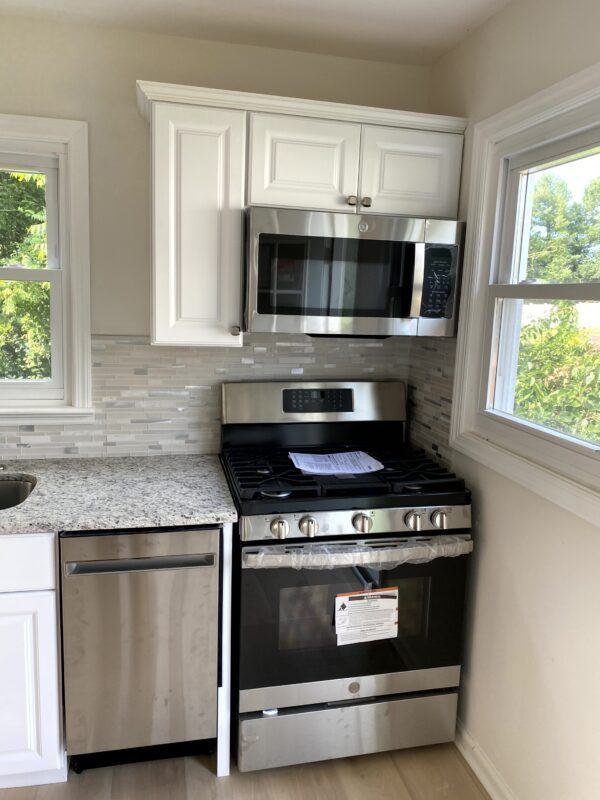 kitchen renovation with custom cabinetry and professional finish work